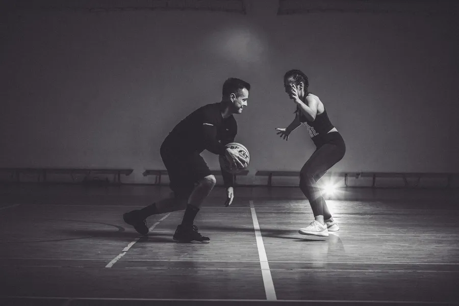 Defensive stance with a Basket Bullet medicine ball