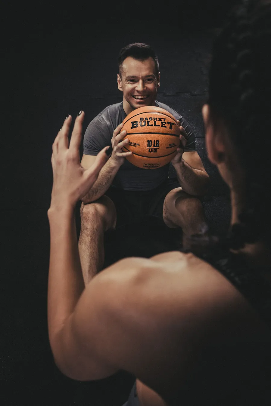 Paired training with a Basket Bullet medicine ball