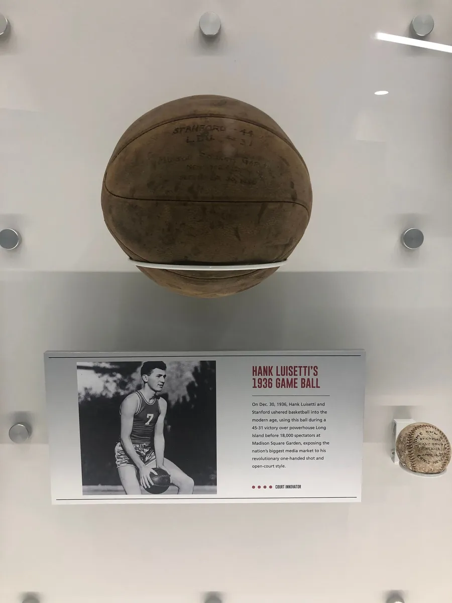 A Basket Bullet medicine ball next to a 1936 game ball