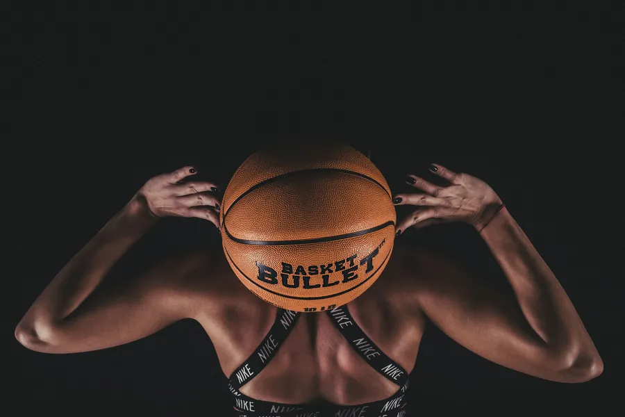 Overhead lift from behind with a Basket Bullet medicine ball
