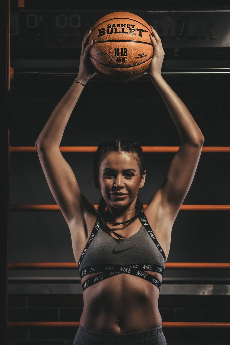 Straight overhead press with a Basket Bullet medicine ball